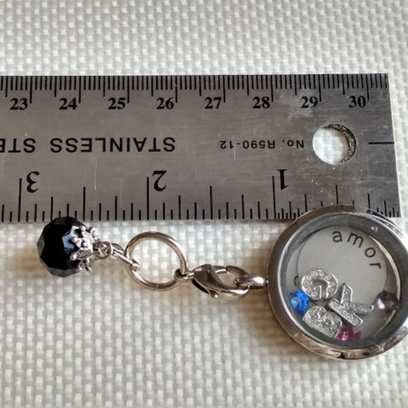 Silver Tone Locket with Black Charm and Trinkets Inside - Picture 6 of 6